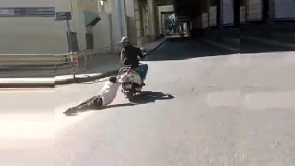 Scooty rider drags a man for a long distance after an accident in Bengaluru
